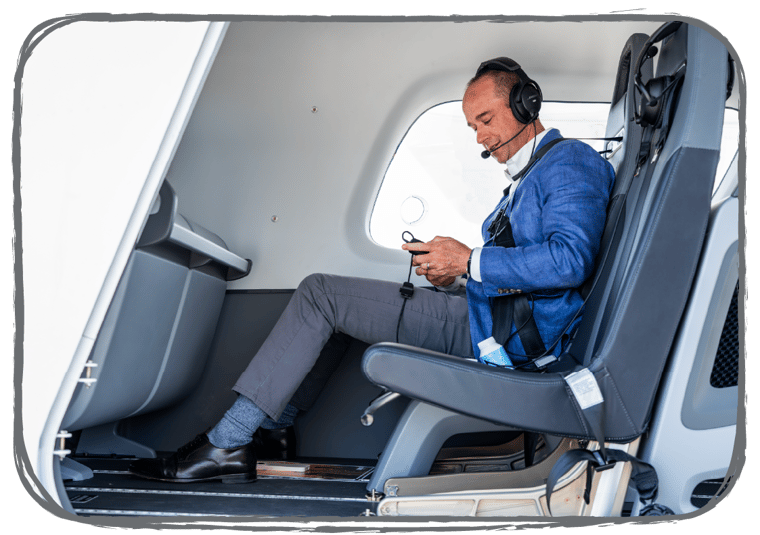 A passenger sits in the back of ALIA