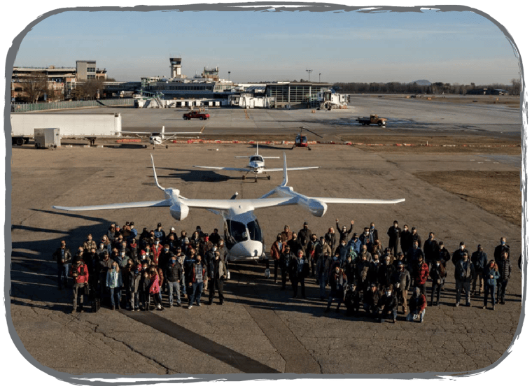 A shot of the team with BETA's first aircraft